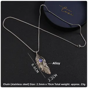 Détails du collier avec pendentif plume œil turc et chaîne en acier inoxydable de 70 cm