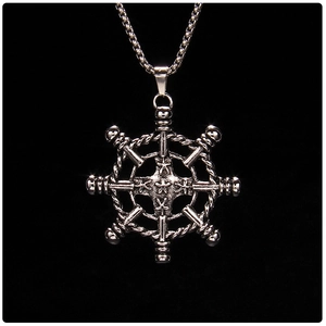Detailed view of vintage stainless steel anchor pendant with nautical rope textures