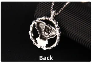Macro view of the industrial back design on a punk style silver metal pendant necklace