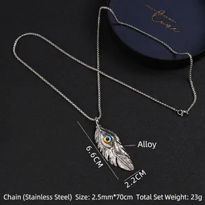 Collier vintage avec pendentif plume et œil maléfique sur chaîne à billes en acier inoxydable