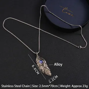 Collier rétro en acier inoxydable avec pendentif plume œil turc et pierre bleue
