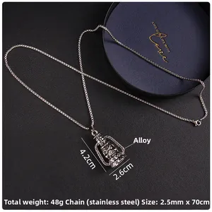 Macro view of retro skull lantern pendant with detailed relief and stainless steel chain