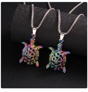 Close-up of vibrant rainbow plated turtle pendants with intricate geometric shell patterns