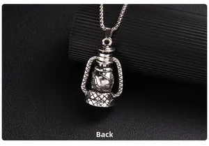 Macro view showing the back of the vintage kerosene lamp pendant with box chain