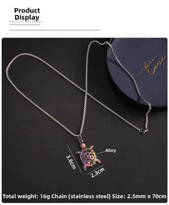 Detail showing 3.8x2.3cm colorful sea turtle pendant on 70cm stainless steel chain