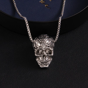 Gothic silver skull pendant necklace with intricate carvings and hip-hop box chain
