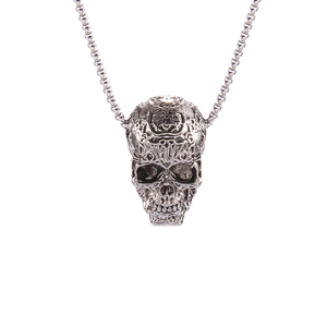 Retro silver hollow skull pendant necklace with intricate carvings and box chain