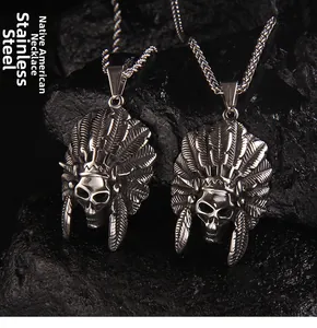 Macro shot of stainless steel Native American skull pendant with detailed feather texture