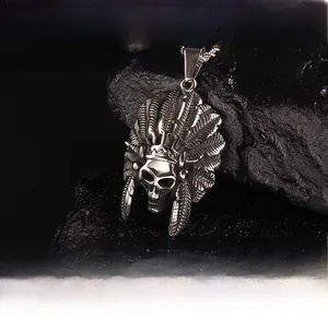 Macro shot of retro stainless steel Indian feather skull pendant with polished textures