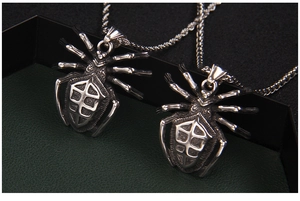Close-up of gothic spider pendant necklace with vintage blackened stainless steel detail
