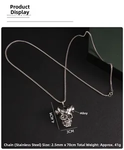 Macro shot of gothic ram horn skull pendant with stainless steel chain necklace