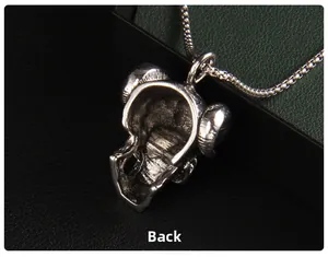 Macro shot of the hollowed back detail on the gothic bull horn skull necklace