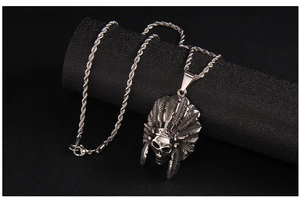 Macro detail of punk skull pendant with intricate Indian feather headdress on rope chain