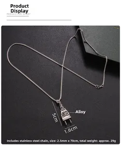 Detail view of punk skull plug pendant with alloy finish and stainless steel chain dimensions