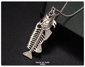 Detail of silver fishbone pendant on leather showing identical double-sided craft