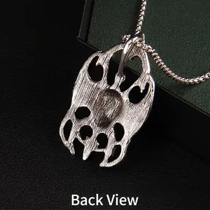 Collier pendentif crâne de flamme punk en argent vintage avec vue de l'arrière