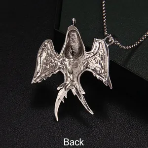Silver bird swallow skull pendant necklace back view with vintage punk style texture