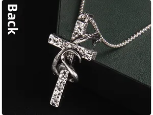 Macro view of the back of the vintage snake and cross pendant with hammered texture