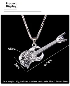 Close-up of rock punk guitar skull pendant showing dimensions 6.6cm x 2cm and steel chain