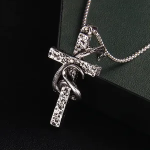 Punk style stainless steel snake wrapped cross necklace with vintage hammered texture
