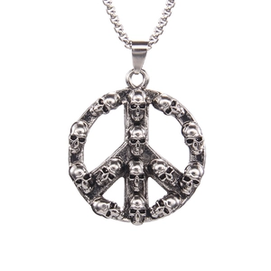 Retro hip hop peace sign necklace with gothic skull details on long silver chain