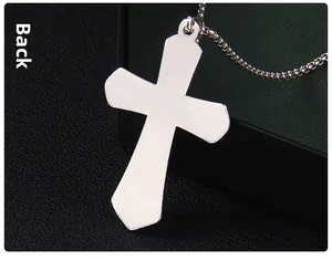 Detailed back view of silver stainless steel cross pendant with matte metallic finish