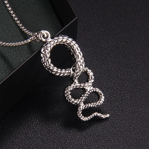 Silver stainless steel snake pendant necklace with detailed scales on a round box chain