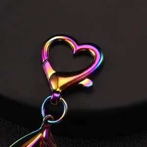 Gradient rainbow heart keychain with lobster clasp made of iridescent plated metal