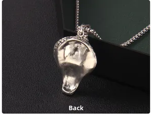 Detailed back view of the vintage cobra snake pendant showing the textured silver finish