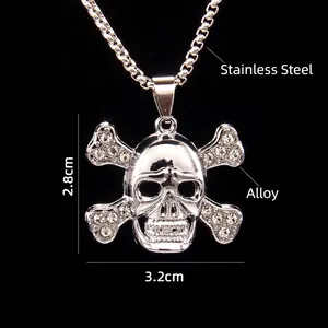 Gothic silver skull and crossbones necklace with sparkling crystals on a long chain