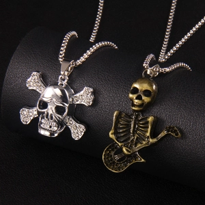 Gothic skull pendants featuring guitar skeleton and rhinestone crossbones designs