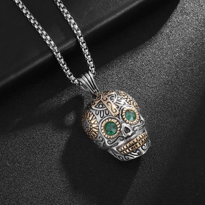 Punk vintage stainless steel skull necklace with green gemstone eyes and gold cross