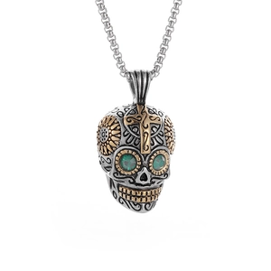 Retro punk stainless steel skull necklace with green gem eyes and golden cross detail