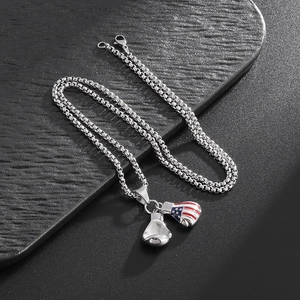 Polished stainless steel boxing glove pendant necklace with USA flag enamel detail