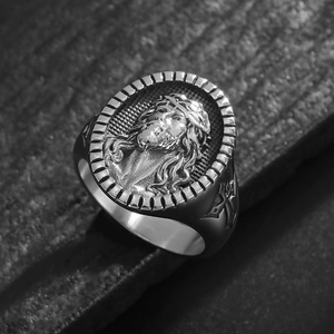 Vintage religious hip hop ring with polished Jesus relief and silver cross detail