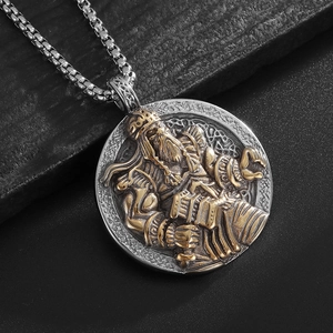 Polished stainless steel Viking Odin pendant necklace with gold accents and box chain