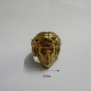 Macro detail of gold plated Jesus portrait ring showing 26mm width dimensions