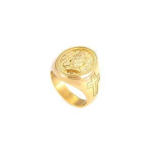 Gold stainless steel ring featuring hands in prayer and cross side engravings