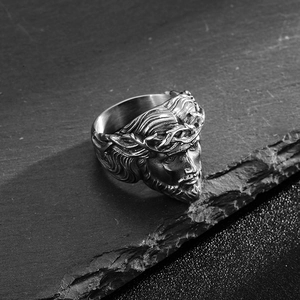 Retro stainless steel men's ring featuring 3D Jesus portrait on dark stone background
