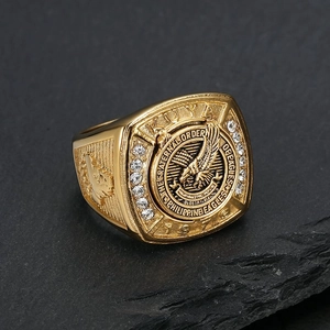 Gold-plated Philippine Eagles Brotherhood signet ring with white crystal inlay