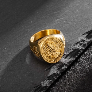 Vintage golden stainless steel ring featuring relief prayer hands and cross patterns