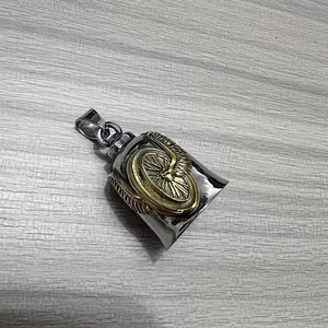Stainless steel guardian biker bell featuring vintage gold wing and wheel relief