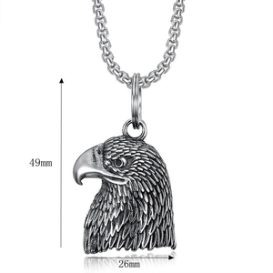 Macro shot of vintage steel eagle biker bell pendant showing 49mm by 26mm dimensions