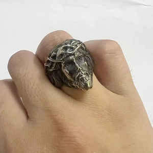 Detailed view of vintage silver Jesus Christ portrait ring with crown of thorns design