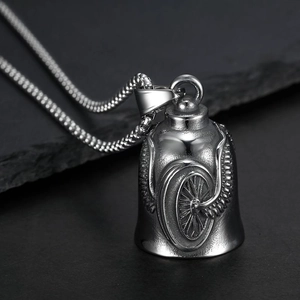 Stainless steel biker bell pendant with wing wheel engraving on a silver box chain