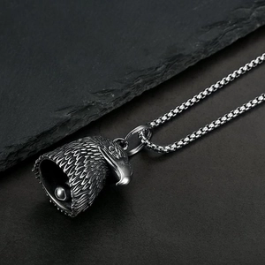 Polished stainless steel eagle head biker bell pendant with vintage feather texture on box chain