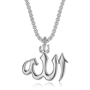 Macro shot of polished silver Allah calligraphy pendant on a box chain with reflection