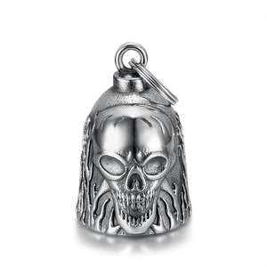Retro stainless steel motorcycle guardian bell pendant with 3D skull relief on white background