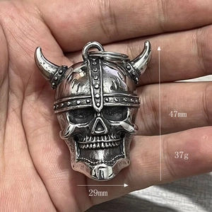 Detailed view of Viking skull guardian bell pendant with dimensions 47mm by 29mm