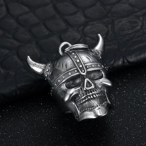 Vintage stainless steel Viking skull helmet pendant with textured biker bell design